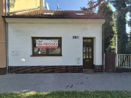 Prodej polořadového RD 6+1 se sklepem, terasou, zahradou a parkováním v Brně, Řečkovicích na ulici Gromešova